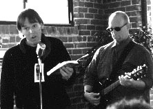 John reads aloud with Dirk Sutro playing guitar